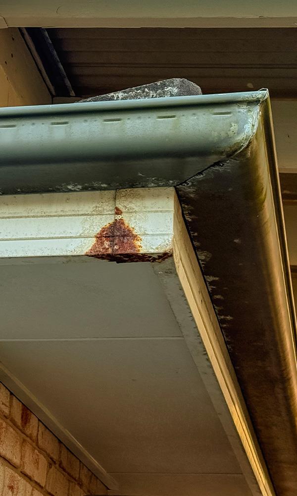 rusted corner of gutter